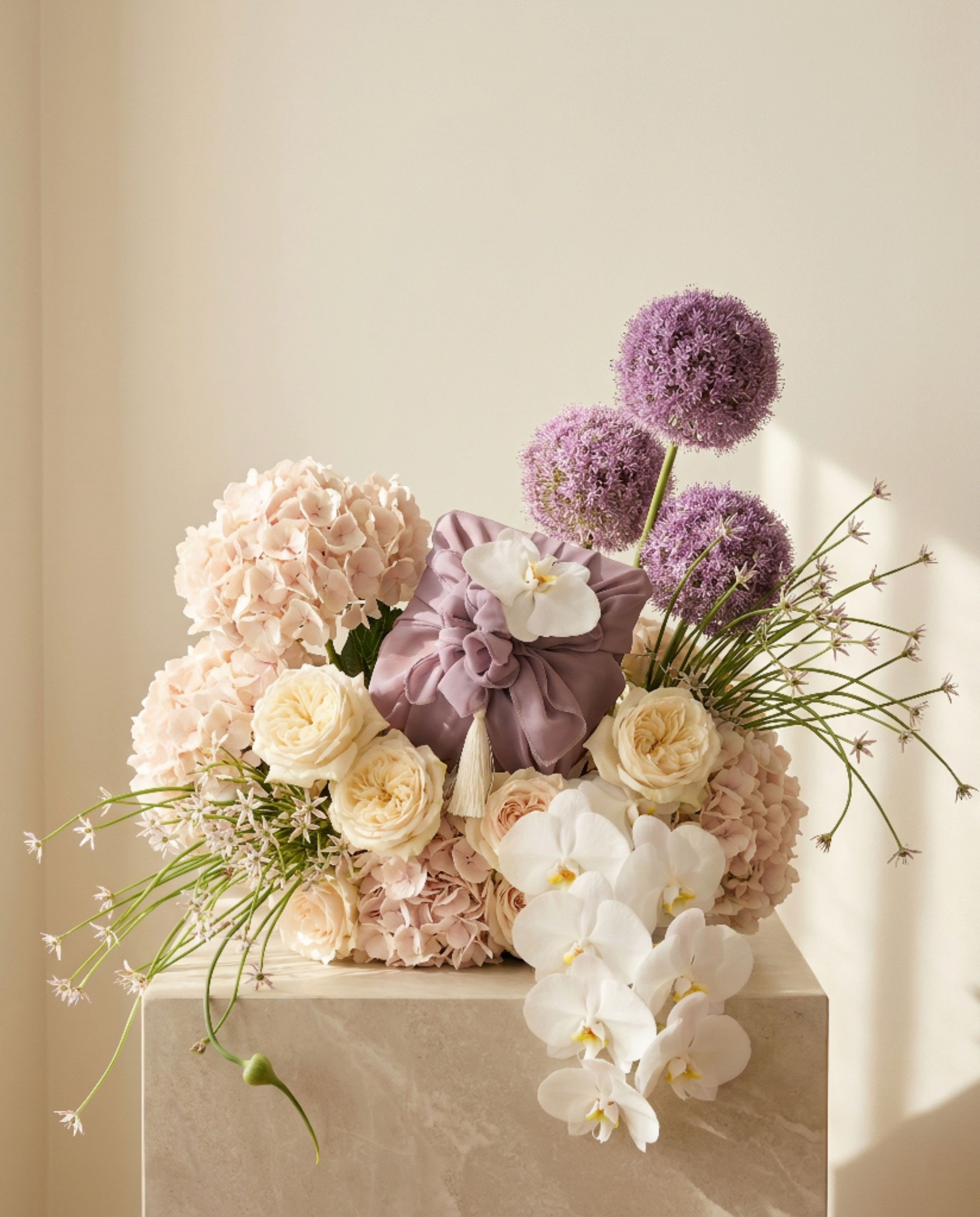 Gifting with a Pink and Purple Floral Arrangement