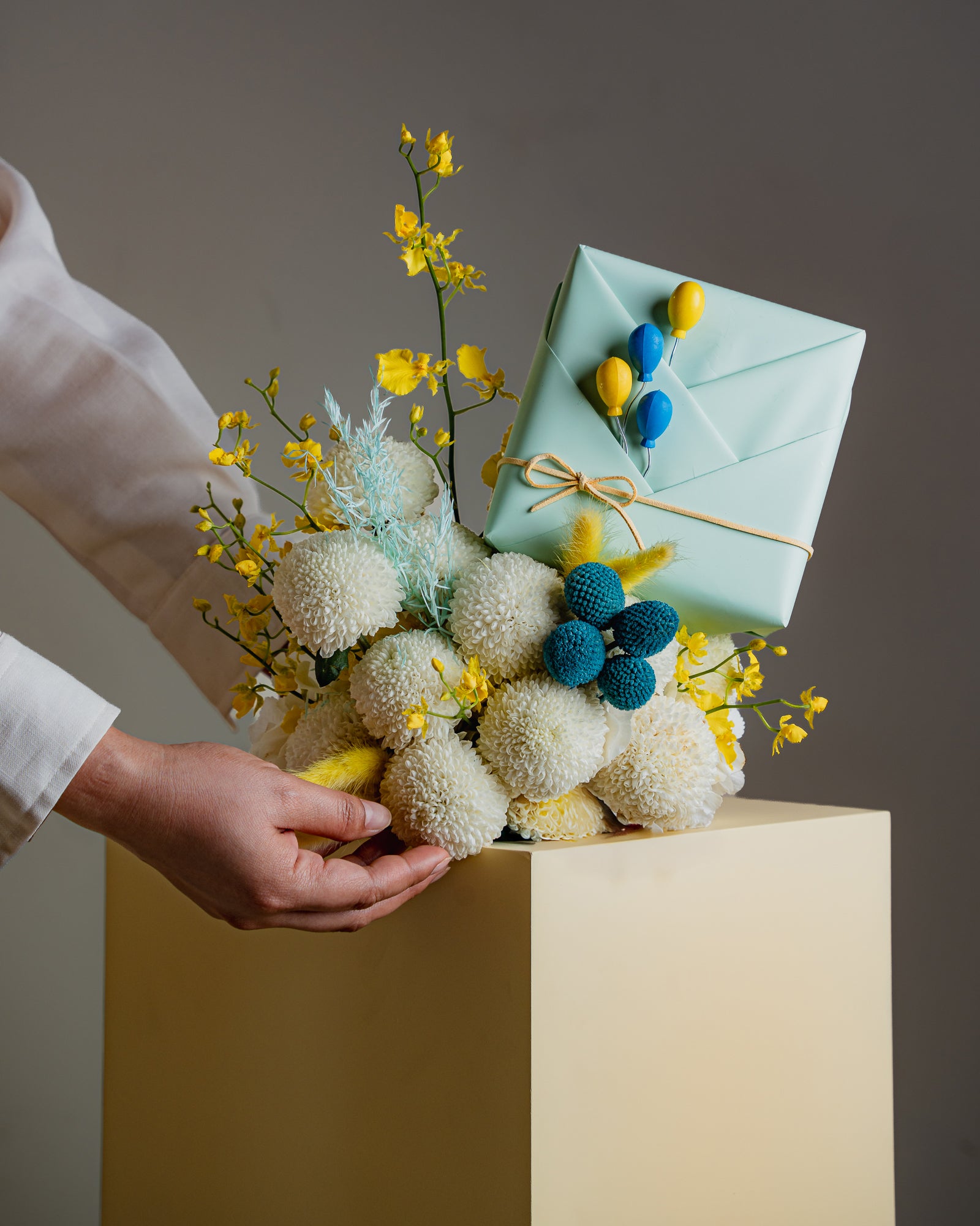 Sunny Yellow and Sky Blue Flower Arrangement