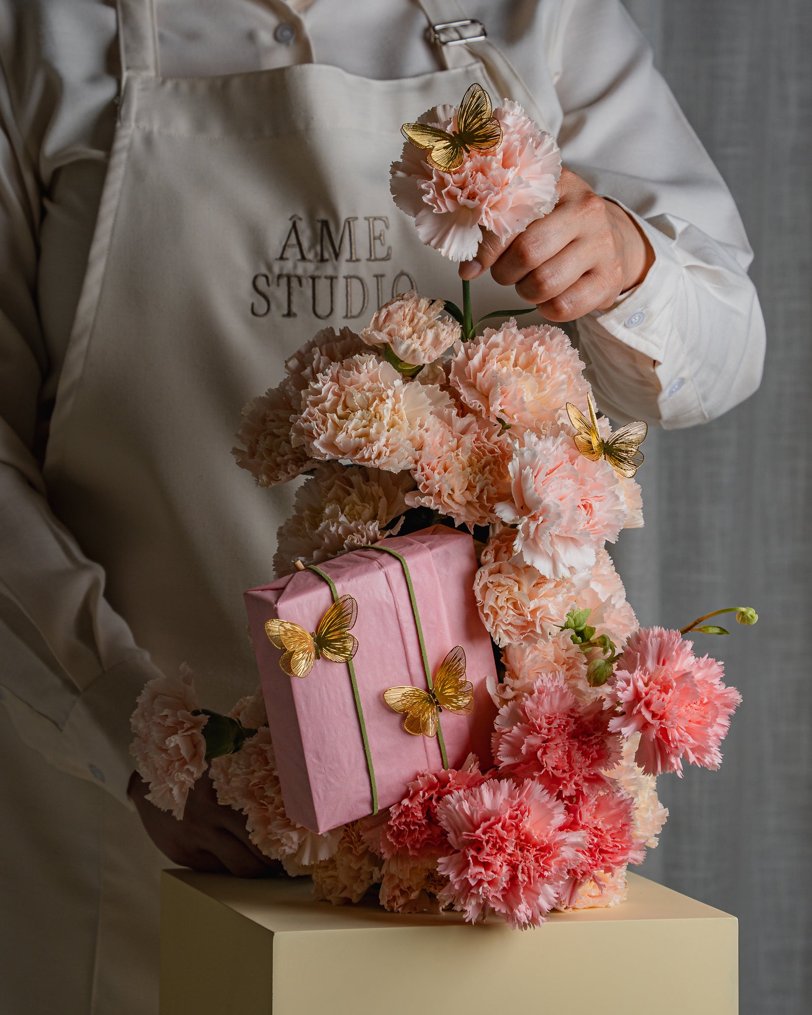Blush Carnations and Golden Butterflies