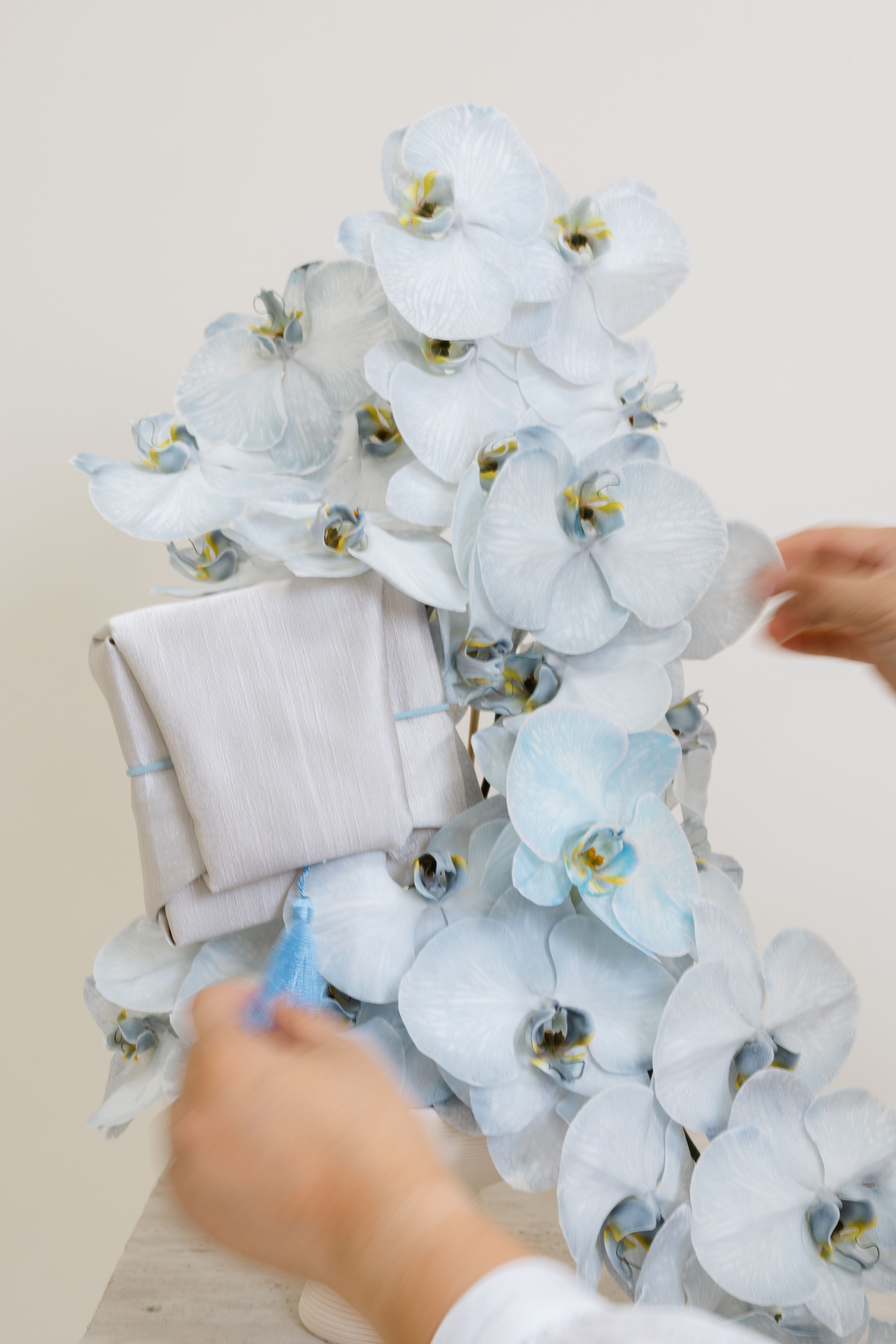 Gifting with Blue Floral Arrangement in a Vase 2