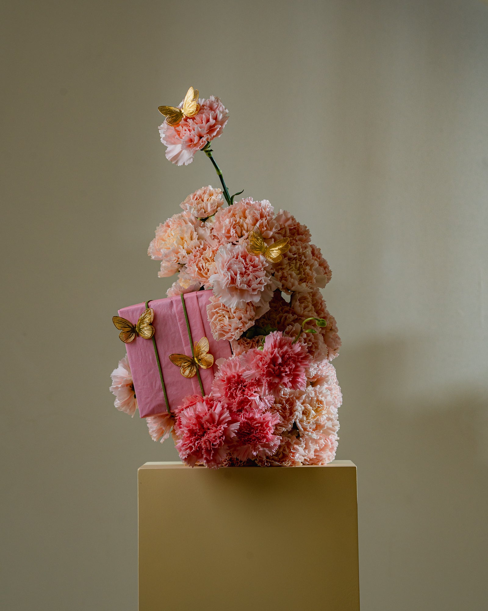 Blush Carnations and Golden Butterflies