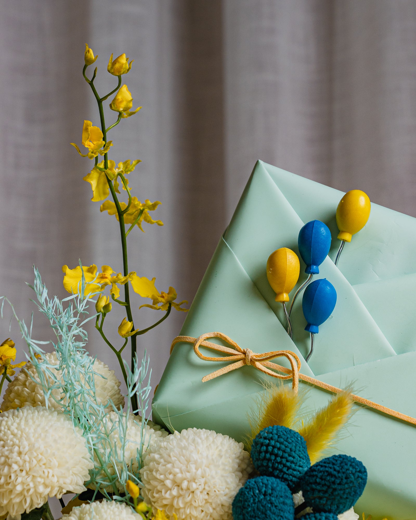 Sunny Yellow and Sky Blue Flower Arrangement