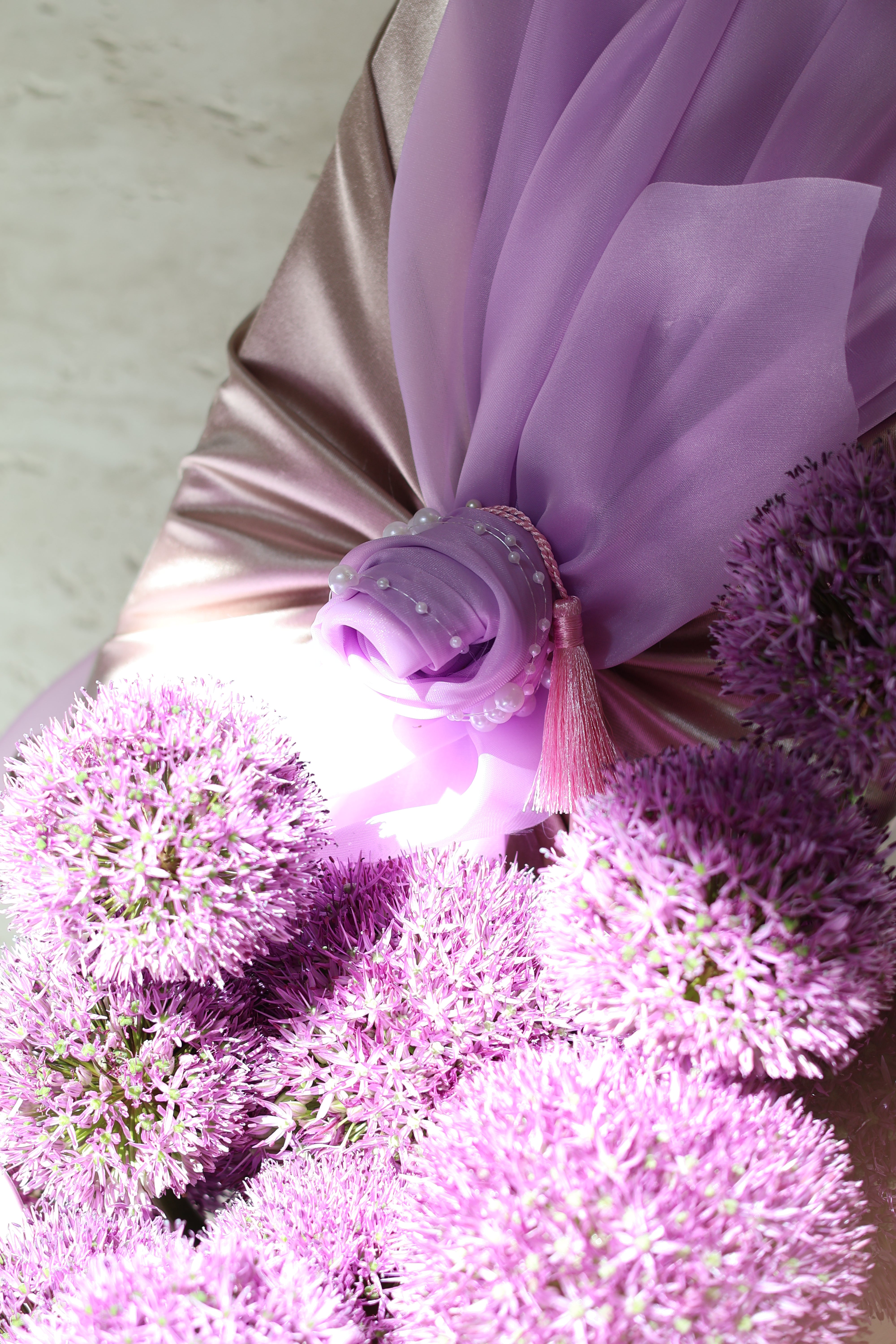 Gifting with a Purple Floral Arrangement in a Vase 2