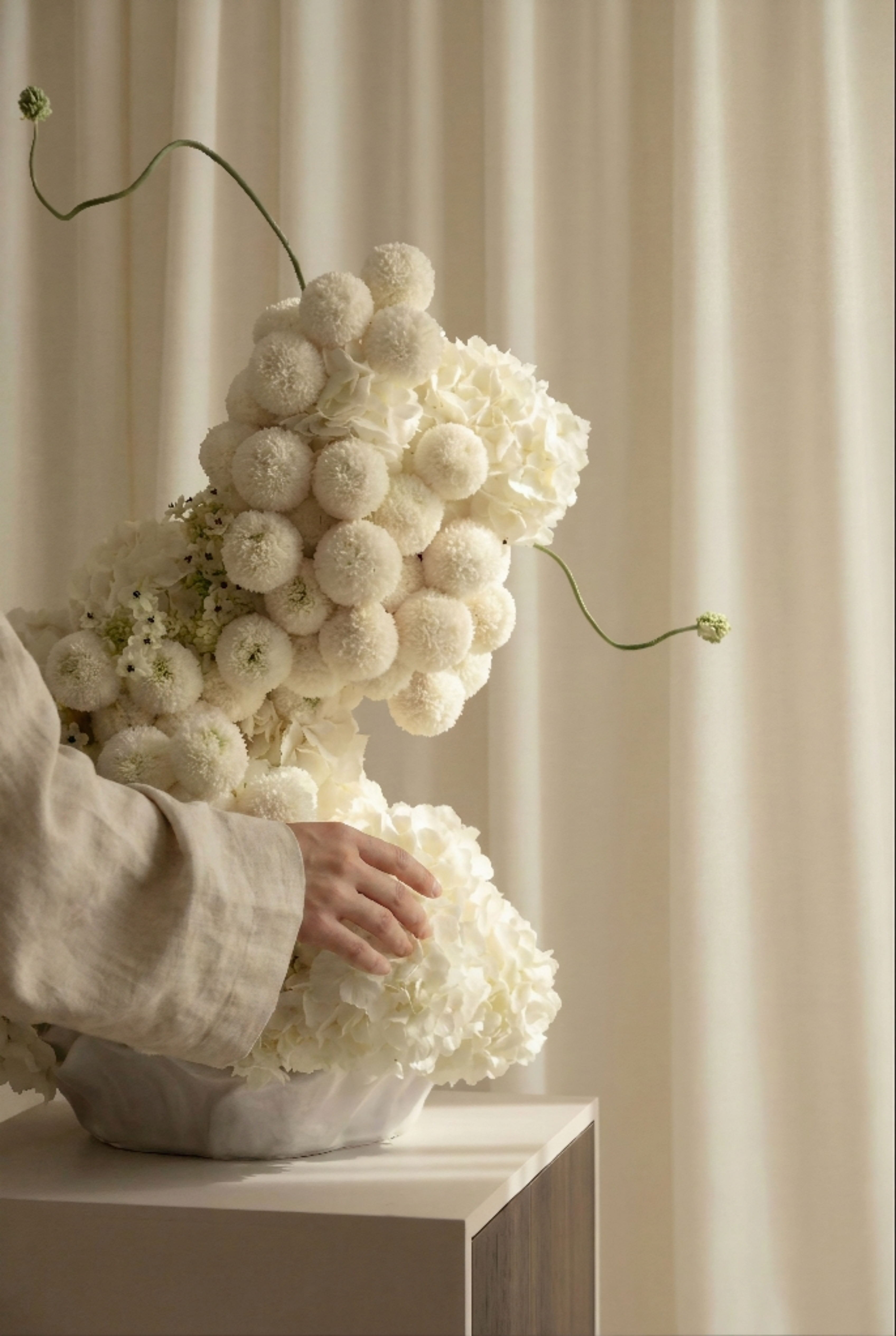 Pure White Floral Arrangements in Mother of Pearl Inspired Vase