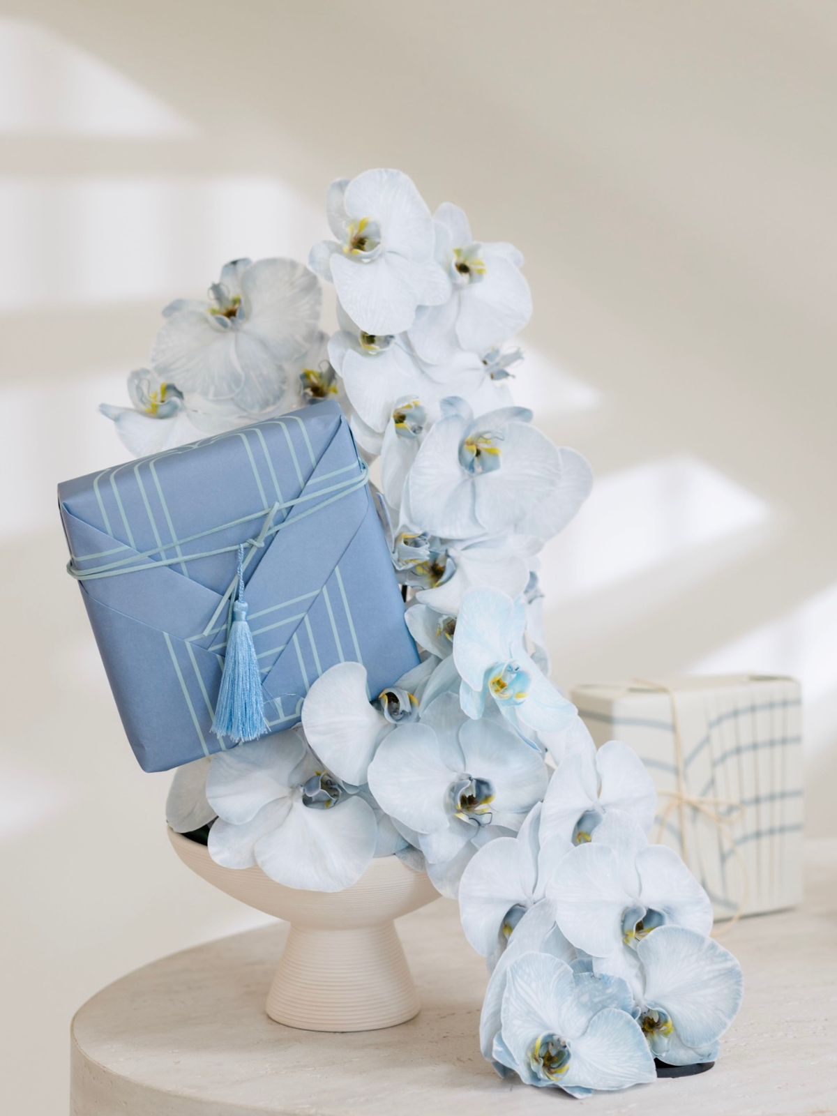 Gifting with Blue Floral Arrangement in a Vase 1